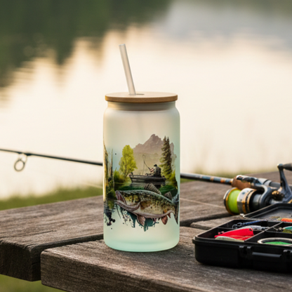 Fishing setup with a mason jar and fishing gear on a wooden table by a lake.