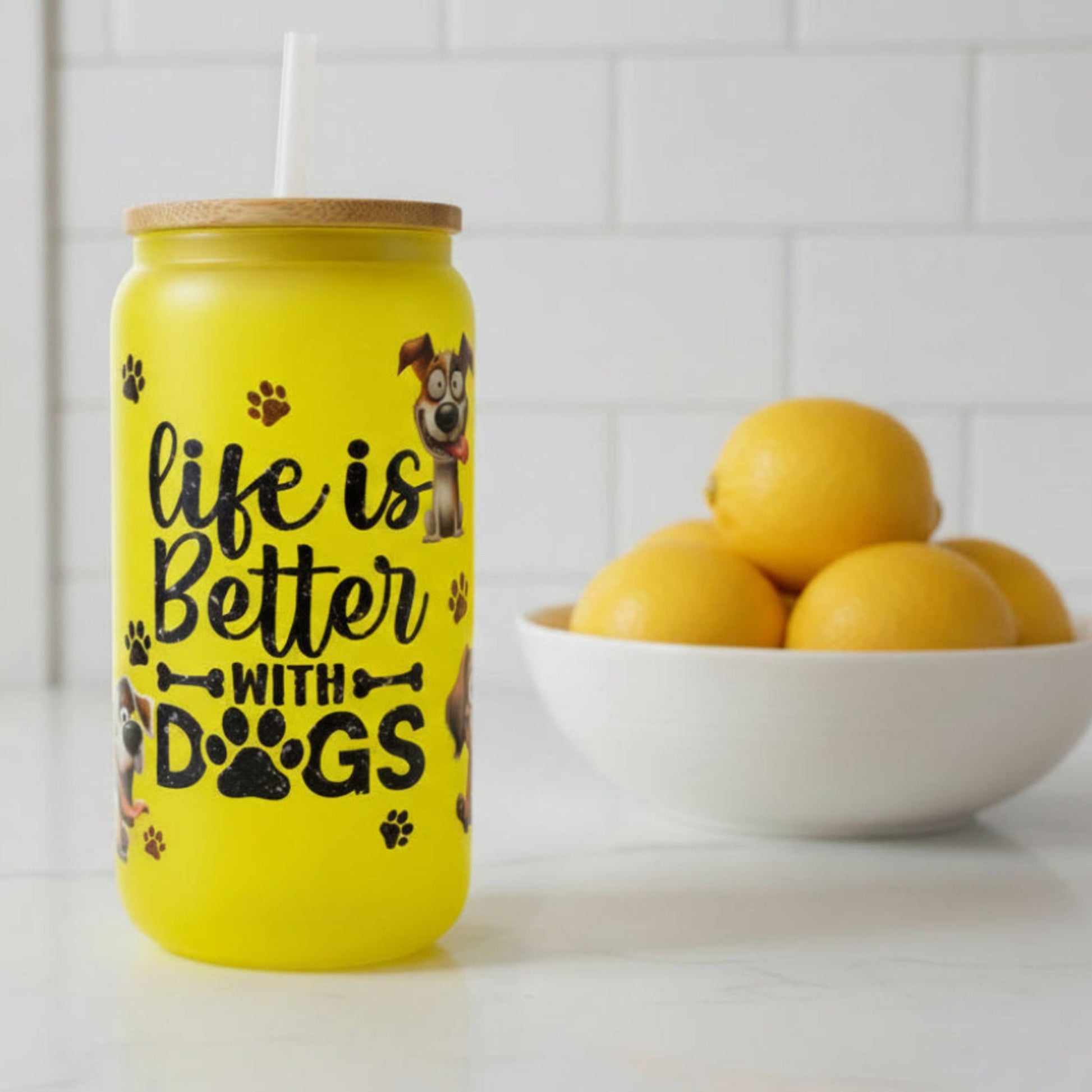 Yellow mug with text and paw prints on a white background
