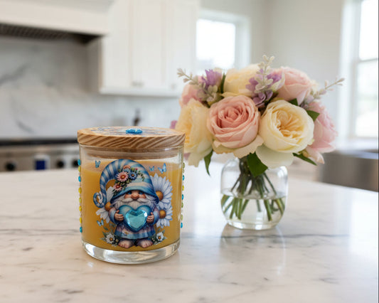 Decorative wooden box with painted design of a gnome and flowers on a white background