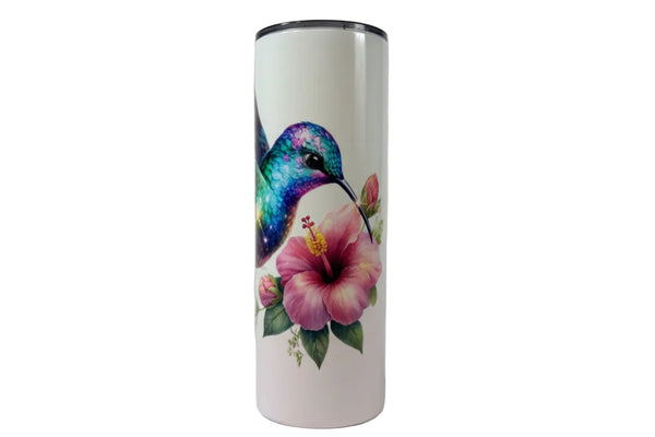 Tumbler with a colorful hummingbird and pink flower design on a white background
