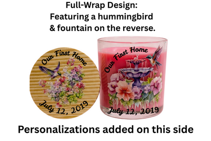Pink candle with hummingbird and fountain design and wooden coaster with floral design and text.