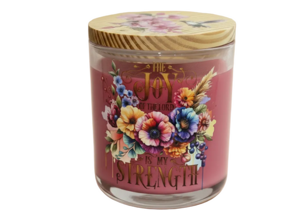 Candle jar with floral design and text on a white background